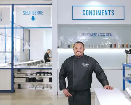  ?? GAVIN YOUNG ?? Roger Mooking stands in the new Telus Spark cafe called Social Eatery by Roger Mooking this week. The celebrity chef says his goal is to make the dining area a place that will generate memories for visitors just as the science centre itself does.