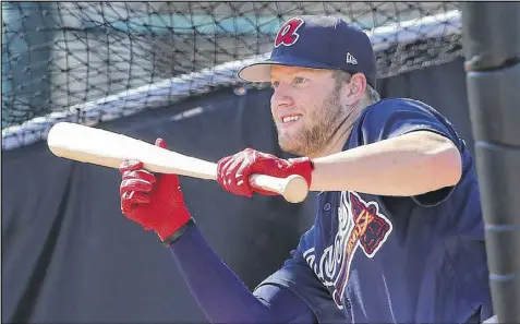  ?? CURTIS COMPTON / CCOMPTON@AJC.COM ?? Braves outfielder Dustin Peterson likely will begin the season at Triple-A Gwinnett. If he keeps producing at the plate, he could get called up this season, depending on the outfield situation.