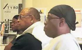  ?? ANDREA K. MCDANIELS/BALTIMORE SUN ?? Robert Boyd, right, attends the Bon Secours meeting. He earned a GED and a bachelor’s degree in criminal justice while in prison and hopes to build a new life as a free man.