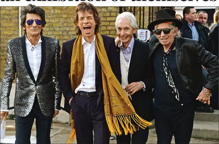  ??  ?? Rolling into town: Ronnie Wood, left, Mick Jagger, Charlie Watts and Keith Richards arriving at the Saatchi Gallery last night to open the exhibition about the Stones