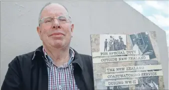  ??  ?? Not forgotten: Dale Williamson with his new book, which examines the New Zealand Coastwatch­ing service during World War II.