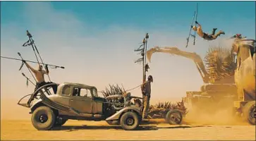  ?? Jasin Boland Warner Bros. ?? GEORGE MILLER’S “Mad Max: Fury Road” took the Cannes fest by storm in 2015 with its powerful imagery.