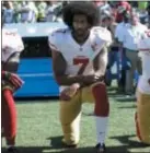  ?? AP PHOTO/TED S. WARREN ?? San Francisco 49ers’ Colin Kaepernick kneels during the national anthem before an NFL football game against the Seattle Seahawks.