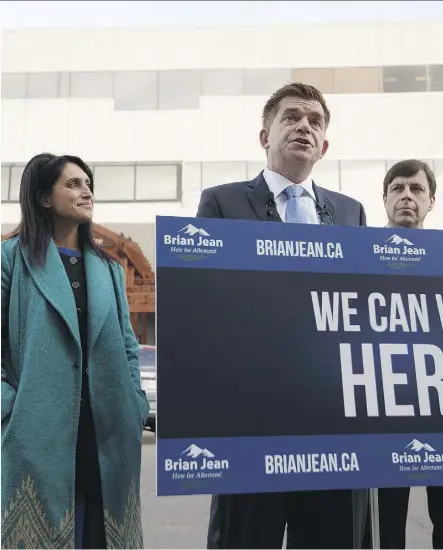  ?? IAN KUCERAK ?? UCP leadership candidate Brian Jean speaks at a news conference with MLAs Leela Aheer, left, and Todd Loewen in front of Premier Rachel Notley’s Edmonton constituen­cy office Tuesday.