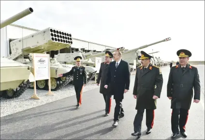  ??  ?? Supreme Commander Ilham Aliyev tours a newly built military camp of a military unit of the Defense Ministry in Pirekeshku­l settlement on January 23.