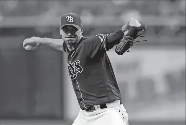  ?? CHRIS O’MEARA/AP PHOTO ?? Tampa Bay Rays pitcher Charlie Morton goes into his delivery to the Boston Red Sox during the first inning of Wednesday’s game at St. Petersburg, Fla.