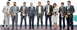  ??  ?? Capital Alliance Securities Research Team with awards