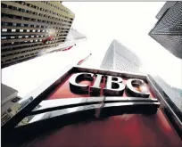  ?? CP PHOTO ?? A CIBC sign is shown in the financial district in Toronto.