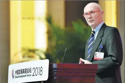  ?? LI XIN / CHINA DAILY ?? Pascal Lamy delivers a speech at the 2018 China Developmen­t Forum in Beijing on March 24.