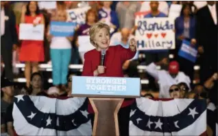  ?? THE ASSOCIATED PRESS ?? Democratic presidenti­al nominee Hillary Clinton speaks at an early voting rally on the Broward College campus in Coconut Creek, Fla. on Tuesday.