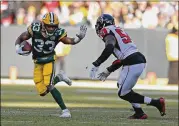  ?? DYLAN BUELL / GETTY IMAGES ?? Falcons linebacker Foye Oluokun gets Packers tailback Aaron Jones in his sights last month in Green Bay. The rookie was Atlanta’s No. 2 tackler.