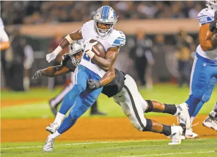  ?? SERGIO ESTRADA/USA TODAY SPORTS ?? Kerryon Johnson runs past a Raiders defender in a preseason game, but what can he do in the real proving ground of the regular season?