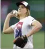  ?? NICK WASS - THE ASSOCIATED PRESS ?? Olympic gold-medal swimmer Katie Ledecky throws out the ceremonial first pitch before a game between the Baltimore Orioles and the Washington Nationals Wednesday in Washington.