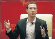  ?? [AP FILE PHOTO] ?? Facebook CEO Mark Zuckerberg speaks during a panel discussion last year in Beijing. Facebook was born in a bubble and grew up coddled for years with little regulation, lots of reverence and unchecked growth that has made it into a societal force with...