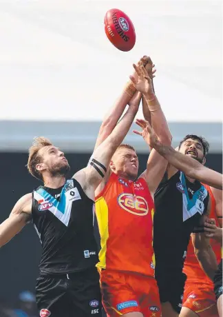  ?? Picture: AAP IMAGE ?? Peter Wright and the Suns have a great chance at finals, says Campbell Brown.