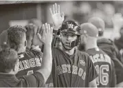  ??  ?? After a thumb injury cost him 42 games, Astros shortstop Carlos Correa returned Sunday, going 1-for-3 and scoring on Cameron Maybin’s home run.