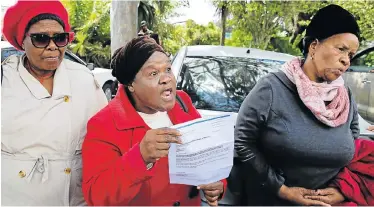  ?? Picture: WERNER HILLS ?? WE WANT OUR SHARE: SMME owners, from left, Linda Metekli, 72, Faniswa Booi, 59, and Nonceba Moyo, 75, gather at the acting city manager’s office in St George’s Park to voice their concerns