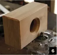  ??  ?? 3. The three pieces all glued up4. Design three has the same 40mm diameter main speaker hole. A 9.5mm Forstner bit was used for the cradle drilling. Using the same settings on the drill press, a smaller 6mm drill bit created the sound slot5. Design three, almost finished6. A bevel was added using a laminate trimmer and a 45-degree cutter 6