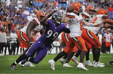  ?? (TNS) ?? The Baltimore Ravens’ Matthew Judon (left) in action during their NFL game against the Cleveland Browns at M&T Bank Stadium in Baltimore on September 29, 2019.