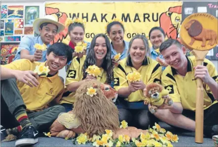  ?? Photo: PETRICE TARRANT ?? Mellow yellow: Uma Takave, back left, Alora Craig, Tatum Atera, Niwa Ahomiro, Bruce Nguyen, front left, Anisha Te Hiko, Ella Livingston and Zak Ven den Berg are making it Daffodil week, not just Daffodil Day, at Forest View High School.