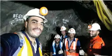  ??  ?? COMS Limited team installing the cable and equipment in the tunnel.