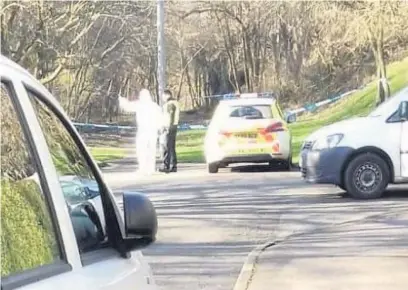  ??  ?? Evidence Forensics at the Glenfarg Road scene