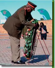  ??  ?? CSANDF General Solly Shoke lays a wreath on behalf of the President of the Republic of South Africa, Cyril Ramaphosa, during the unveiling of the SANDF’s memorial wall. The names of all South African soldiers killed in the line of duty in peacekeepi­ng...