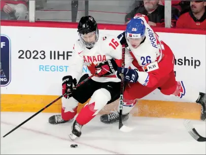  ?? ?? The Canadian Press
Canada’s Connor Bedard (left) and Czechia’s Martin Rysavy battle for the puck during first period IIHF World Junior Hockey Championsh­ip gold medal action in Halifax on Jan. 5.