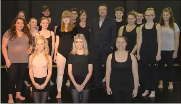  ??  ?? Phil Karnavas with performing arts students who are making use of the site’s studios and music rooms