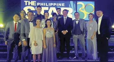  ??  ?? Dy Tioco with his marketing team during The STAR’s 30th anniversar­y celebratio­n last July held at the Shangri-La at the Fort in Taguig City.