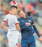  ??  ?? Stephen Welsh up against Turkey U21s