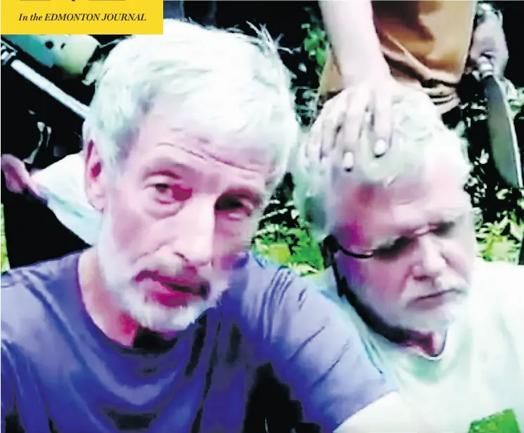  ?? YOUTUBE ?? Canadians Robert Hall, left, and John Ridsdel, kidnapped three weeks ago, have surfaced in a video with gunmen who demand a halt to military operations against them.