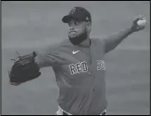  ?? Associated Press ?? Boston Red Sox starting pitcher Eduardo Rodríguez (57) works against the Minnesota Twins on March 11 in Fort Myers, Fla. Rodríguez will miss opening day with a ‘dead arm.’ NO START