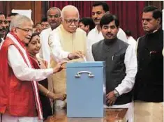  ?? PTI ?? Veterans support BJP leaders L.K. Advani, Sushma Swaraj, Murli Manohar Joshi and others cast their votes.