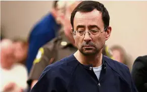  ?? — AFP ?? Facing the law: Nassar in court during the sentencing phase in Ingham County Circuit Court in Lansing, Michigan.