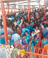  ?? — DC ?? A festive atmosphere prevailed at various temples across the state with people going for Vishesh Pujas and Abhishekam besides regular darshans and archan. People stand in queue for darshan on January 1 at Birla Mandi (left), Chilkur Balaji temple...