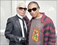  ??  ?? Chanel’s Karl Lagerfeld with musician Pharrell Williams.