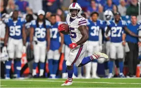  ?? Photograph: Adrian Kraus/AP ?? Christian Wade scoring a touchdown for the Buffalo Bills in a pre-season game against the Indianapol­is Colts in August 2019.