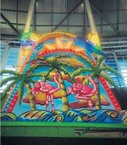  ?? JOE CAVARETTA/STAFF FILE PHOTO ?? Sculpture features “jumping marlins, a pair of flamingos that flap their wings, jetting streams of water and rolling ocean waves that activate when Marlins home runs are hit.”
