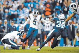  ?? WESLEY HITT/GETTY ?? Rams kicker Sam Ficken attempts a field goal against the Titans in 2017. He was cut after he made just 1 of 3 field goals.