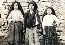  ?? SANTUARIO DE FATIMA/ AFP PHOTO/ ?? From left, Lucia, Francisco and Jacinta Marto are the three shepherds who witnessed the apparition of the Virgin Mary on May 13, 1917.