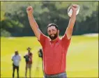  ?? Hector Vivas / Getty Images ?? Jon Rahm celebrates after making a par on the 18th hole to win the Mexico Open on Sunday.