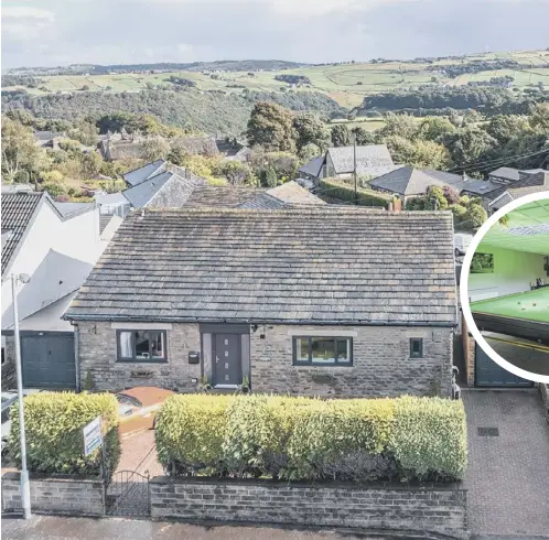  ?? ?? ATTRACTIVE: This property has a central Barkisland village location, with far-reaching views