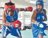  ?? Picture: ATU RASEA ?? Ulaiasi Tovuga throws his left jab against Yeeon Tavawa in the sub junior grade at the Stanley Brown gym in Walu Bay earlier this month.