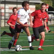  ?? MEDIANEWS GROUP PHOTO ?? Abington’s Bryce Lexow advances the ball while Upper Dublin’s Sean Seabrook defends. Both players made the first team of The Reporter/Times Herald/Montgomery Media All-Area Team.