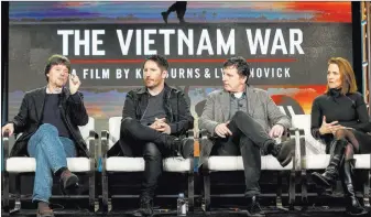  ?? Willy Sanjuan ?? The Associated Press file From left, Ken Burns, Trent Reznor, Atticus Ross and Lynn Novick speak Jan. 15 at PBS’ “The Vietnam War” panel at the Television Critics Associatio­n press tour in Pasadena, Calif.