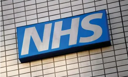  ?? ?? Ministers are about to spend £100m on the latest reorganisa­tion of NHS England. Photograph: Neil Hall/EPA