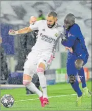  ?? AFP ?? Chelsea's N'golo Kante (R) challenges Real's Karim Benzema.