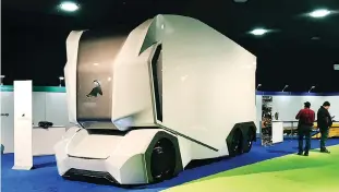  ??  ?? HIGH-TECH models like the Einride T-Pod have arrived at the Detroit show, but convention­al SUVs and trucks still dominate.