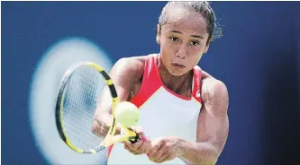  ?? MARK BLINCH THE CANADIAN PRESS ?? Leylah Annie Fernandez returns a shot to Marie Bouzkova of the Czech Republic in round 1 of the Rogers Cup.